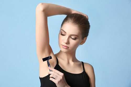 Woman shaving with SKARP razor